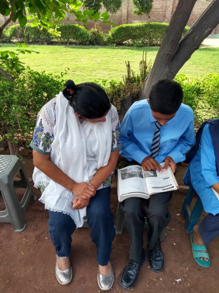 Student reading i a book